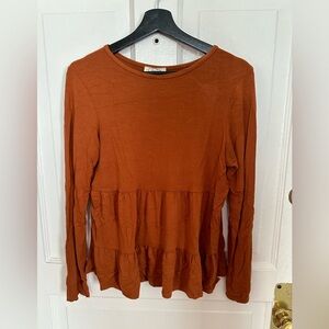 Orange ruffle shirt